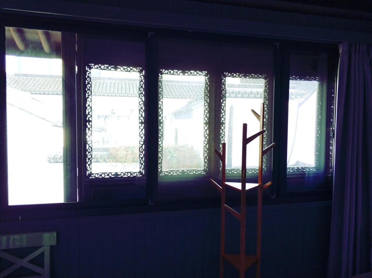 Snail Youth Hostel Huzhou Exterior foto